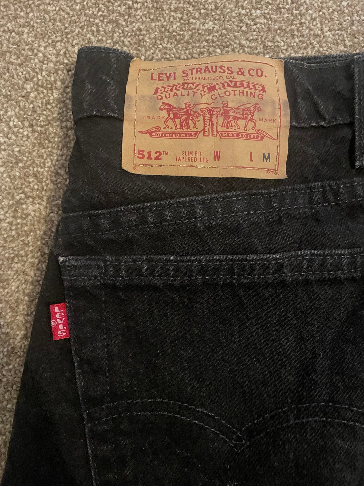 Women’s High Waisted, Slim Fit, Tapered Leg Levi’s Jeans